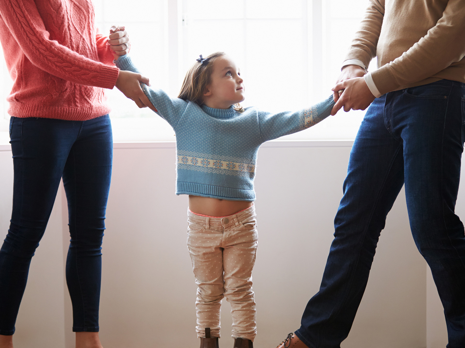 Two Parents Fighting Over Child In Divorce Concept - Colorado Legal Group